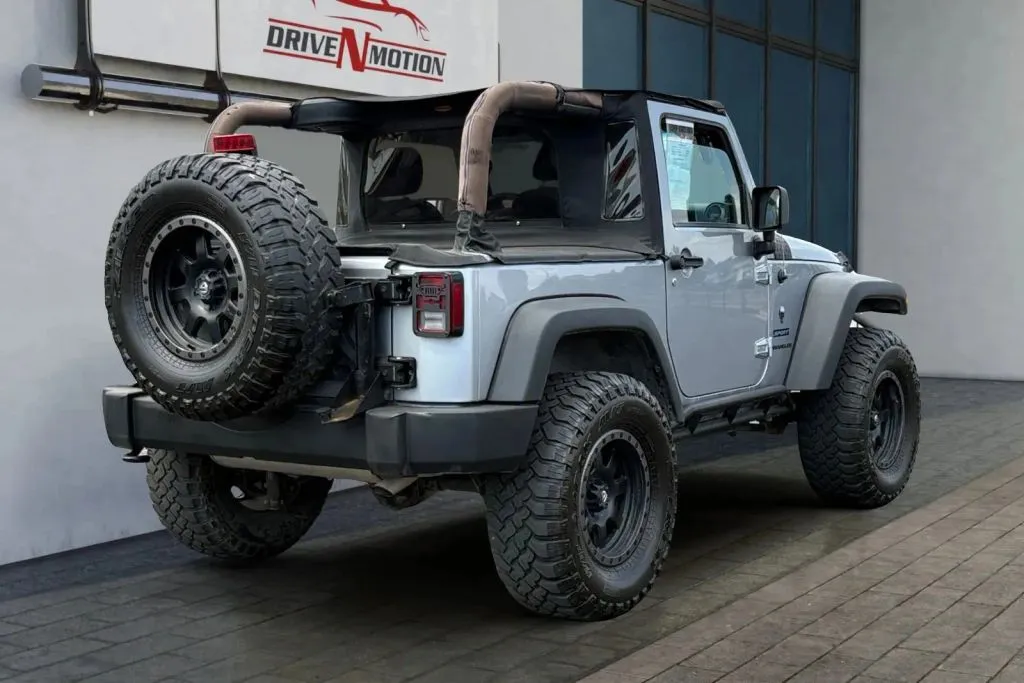 Photos of 2013 Jeep Wrangler Sport SUV 2D for sale in Thornton, CO at Drive N-Motion Thornton