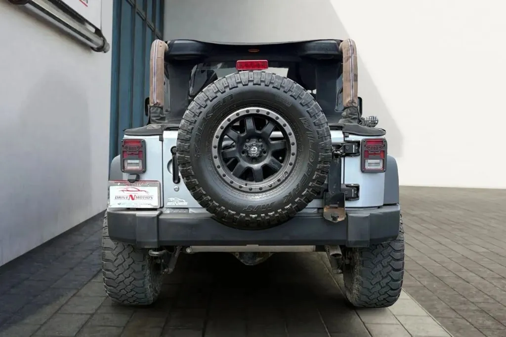 Another view of 2013 Jeep Wrangler Sport SUV 2D for sale in Thornton, CO at Drive N-Motion Thornton