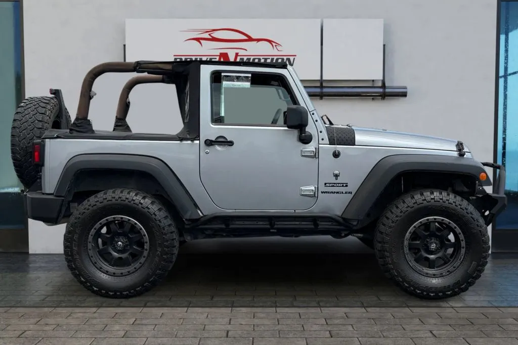 Photos of 2013 Jeep Wrangler Sport SUV 2D for sale in Thornton, CO at Drive N-Motion Thornton