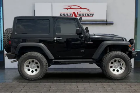 Another view of 2017 Jeep Wrangler Sport SUV 2D for sale in Thornton, CO at Drive N-Motion Thornton