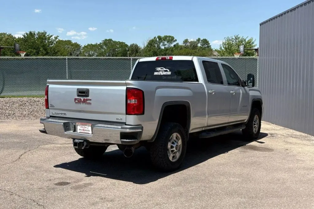 Another view of 2015 GMC Sierra 2500 HD Crew Cab SLE Pickup 4D 6 1/2 ft for sale in Thornton, CO at Drive N-Motion Thornton