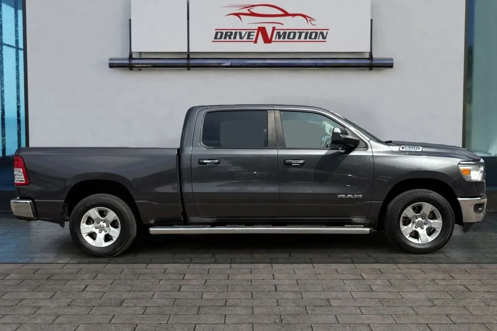 Another view of 2019 Ram 1500 Crew Cab Big Horn Pickup 4D 6 1/3 ft for sale in Thornton, CO at Drive N-Motion Thornton