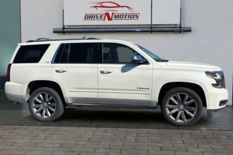 Another view of 2015 Chevrolet Tahoe LTZ Sport Utility 4D for sale in Thornton, CO at Drive N-Motion Thornton