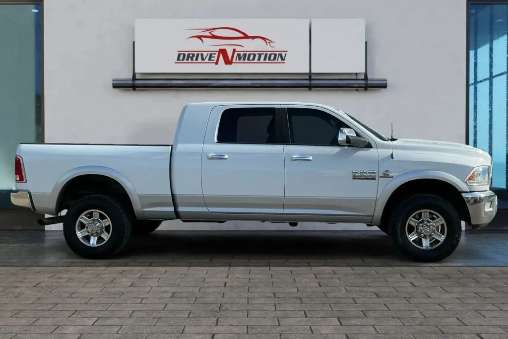 Another view of 2013 Ram 2500 Mega Cab Laramie Pickup 4D 6 1/3 ft for sale in Thornton, CO at Drive N-Motion Thornton