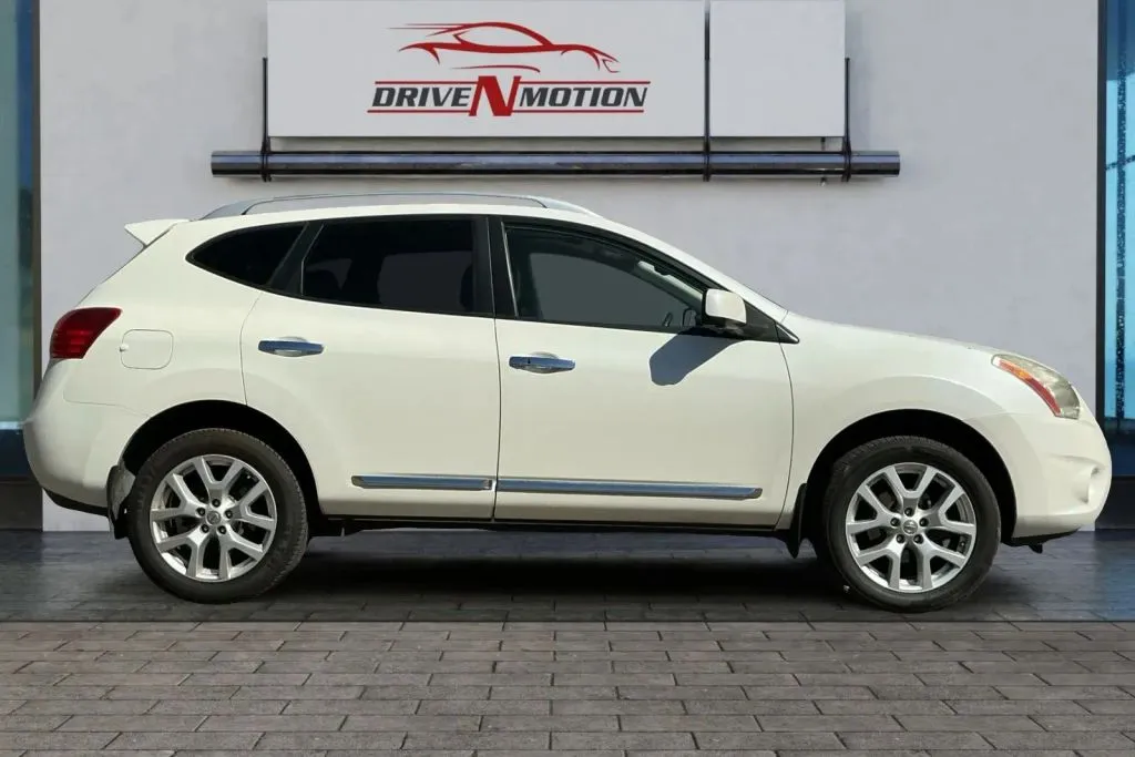 Another view of 2013 Nissan Rogue SV w/SL Pkg Sport Utility 4D for sale in Thornton, CO at Drive N-Motion Thornton
