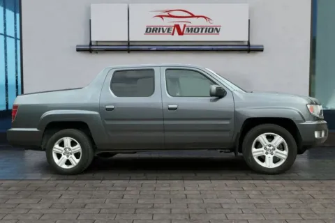 Another view of 2011 Honda Ridgeline RTL Pickup 4D 5 ft for sale in Thornton, CO at Drive N-Motion Thornton