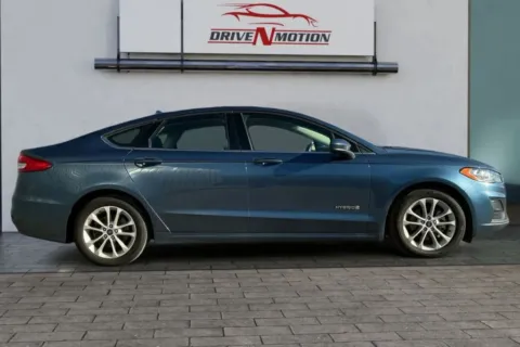 Photos of 2019 Ford Fusion SE Hybrid Sedan 4D for sale in Thornton, CO at Drive N-Motion Thornton