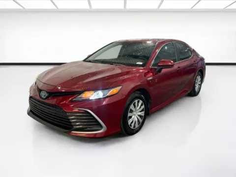 Red 2021 Toyota Camry Hybrid LE for sale in Chandler, AZ