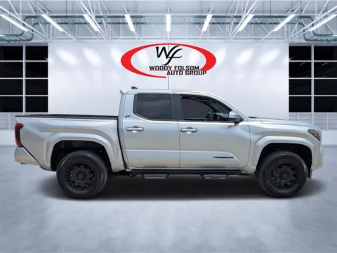 Photos of 2024 Toyota Tacoma SR5 for sale in Douglas, GA at Woody Folsom CDJR of Douglas