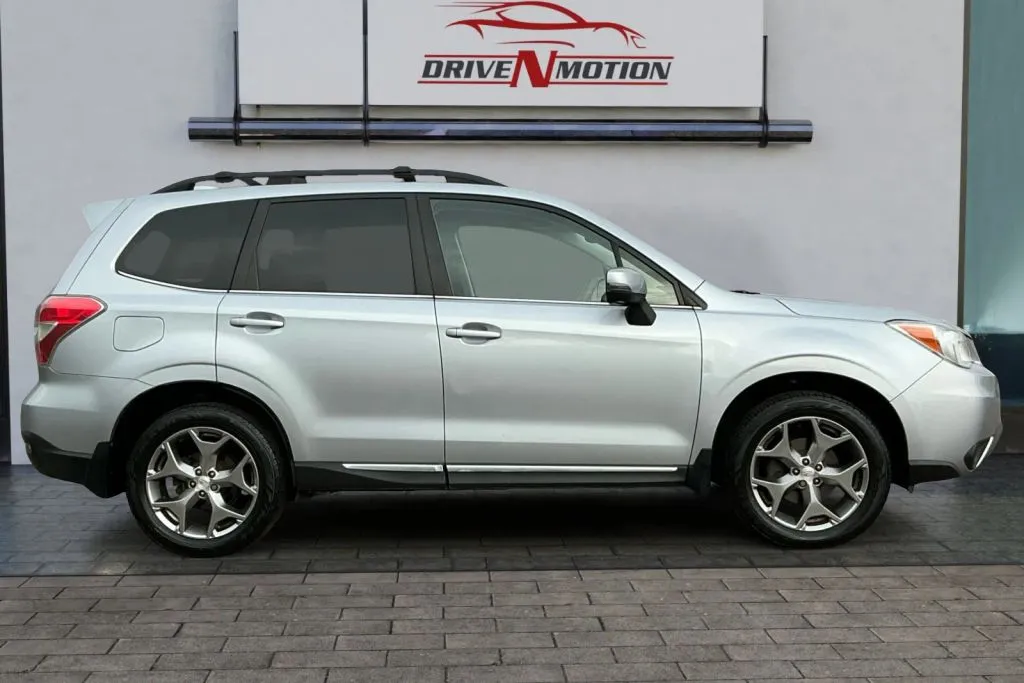 Photos of 2016 Subaru Forester 2.5i Touring Sport Utility 4D for sale in Greeley, CO at Drive N-Motion Greeley