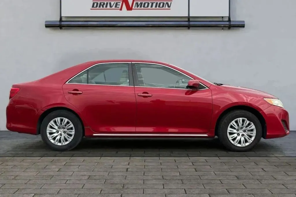 Another view of 2014 Toyota Camry LE Sedan 4D for sale in Greeley, CO at Drive N-Motion Greeley