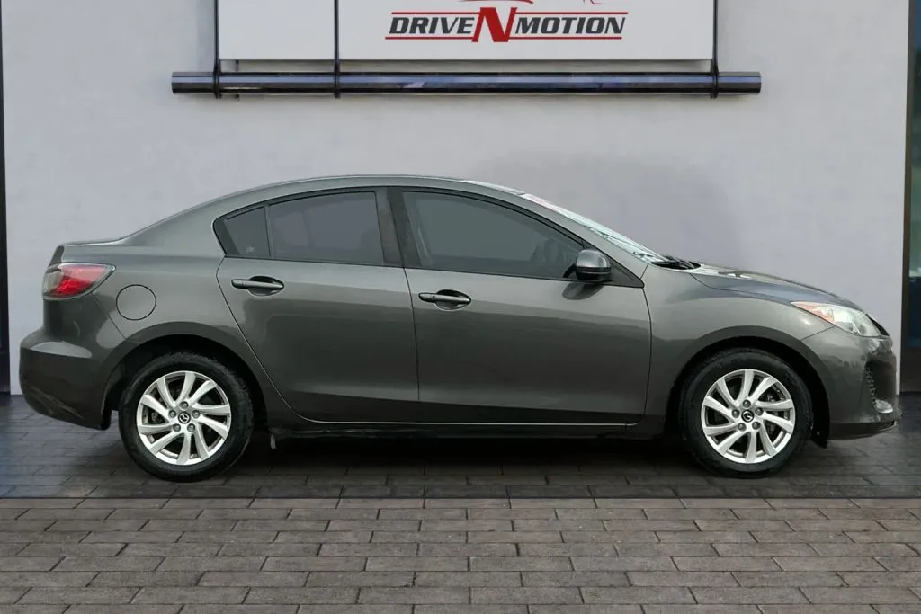 Another view of 2013 MAZDA MAZDA3 i Touring Sedan 4D for sale in Greeley, CO at Drive N-Motion Greeley