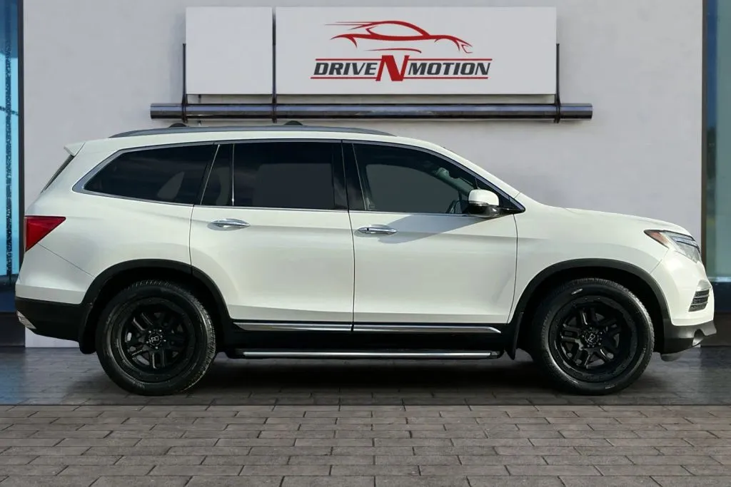 Photos of 2018 Honda Pilot Elite Sport Utility 4D for sale in Greeley, CO at Drive N-Motion Greeley