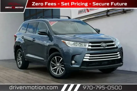 Blue 2019 Toyota Highlander Hybrid XLE Sport Utility 4D for sale in Greeley, CO