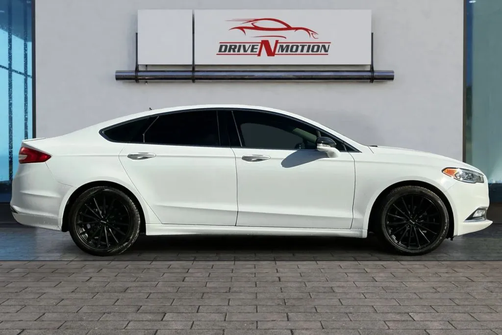 Photos of 2017 Ford Fusion Titanium Hybrid Sedan 4D for sale in Greeley, CO at Drive N-Motion Greeley