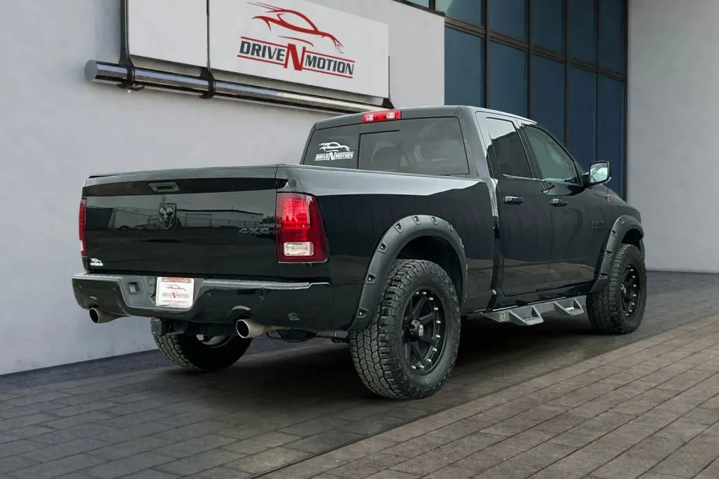Another view of 2015 Ram 1500 Quad Cab Sport Pickup 4D 6 1/3 ft for sale in Greeley, CO at Drive N-Motion Greeley