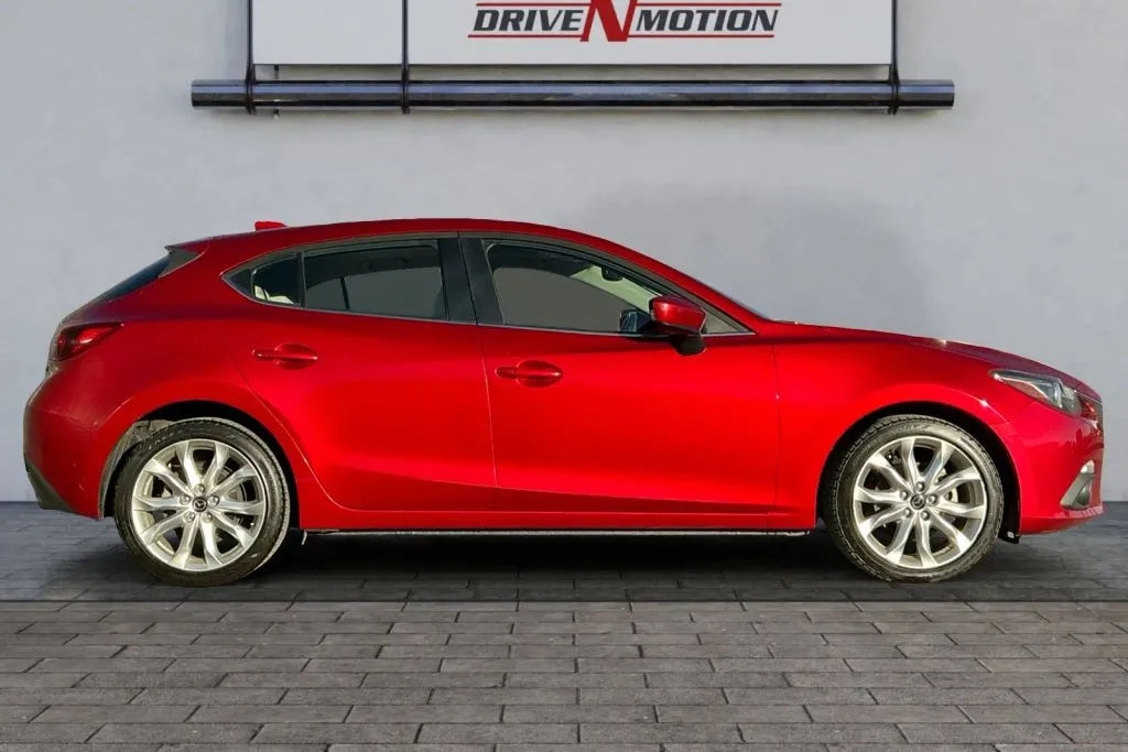 Another view of 2015 MAZDA MAZDA3 s Grand Touring Hatchback 4D for sale in Greeley, CO at Drive N-Motion Greeley