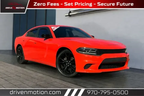 Orange 2018 Dodge Charger SXT Sedan 4D for sale in Greeley, CO