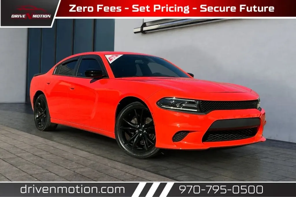 Orange 2018 Dodge Charger SXT Sedan 4D for sale in Greeley, CO