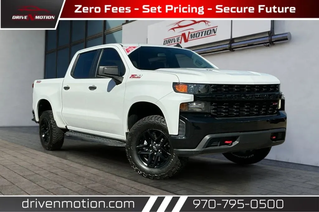 White 2021 Chevrolet Silverado 1500 Crew Cab Custom Trail Boss Pickup 4D 5 3/4 ft for sale in Greeley, CO