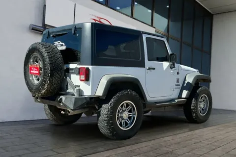 More photos of 2013 Jeep Wrangler Sport SUV 2D at Drive N-Motion Greeley, CO