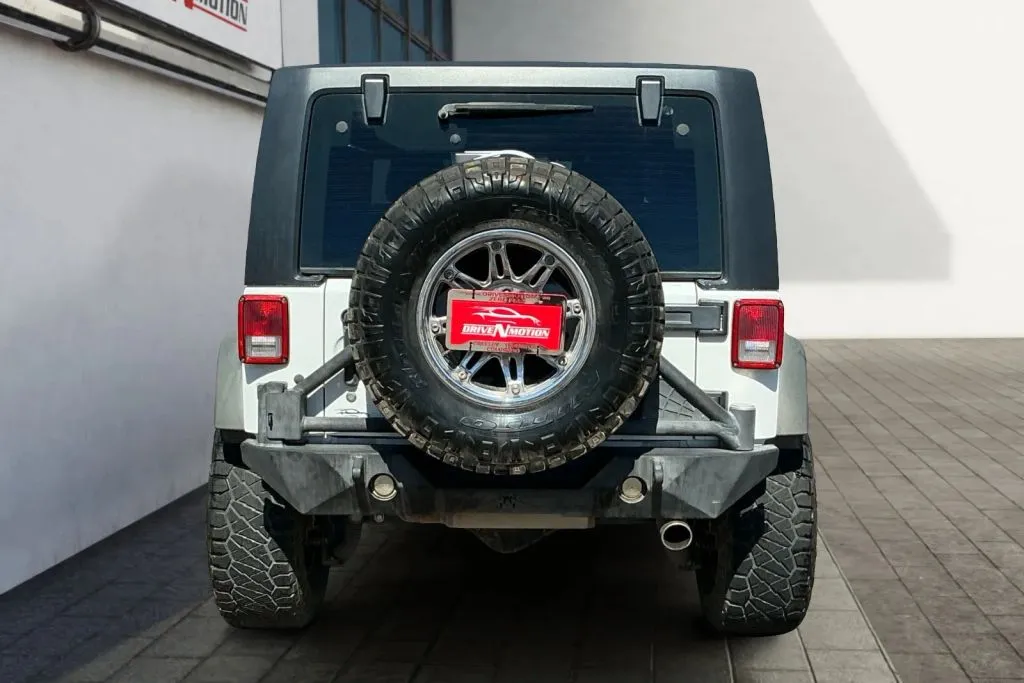 More photos of 2013 Jeep Wrangler Sport SUV 2D at Drive N-Motion Greeley, CO