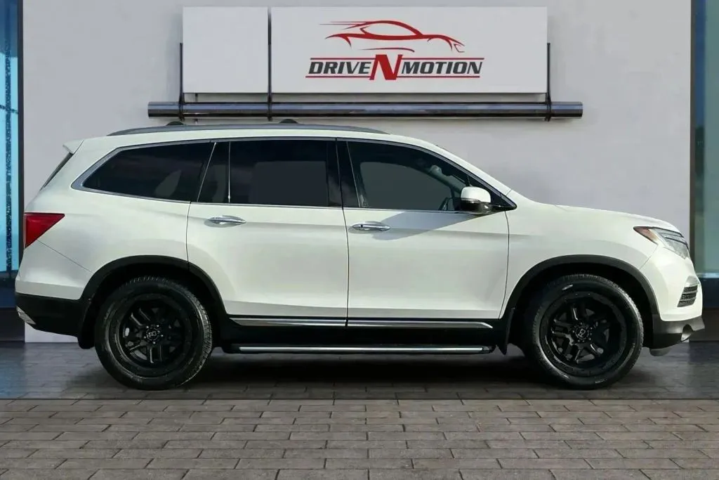 Photos of 2018 Honda Pilot Elite Sport Utility 4D for sale in Greeley, CO at Drive N-Motion Greeley