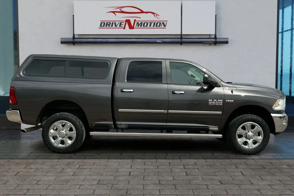 Another view of 2016 Ram 2500 Crew Cab Big Horn Pickup 4D 6 1/3 ft for sale in Greeley, CO at Drive N-Motion Greeley