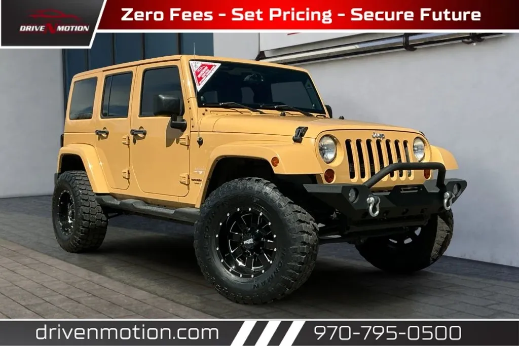 Beige 2013 Jeep Wrangler Unlimited Sahara Sport Utility 4D for sale in Greeley, CO