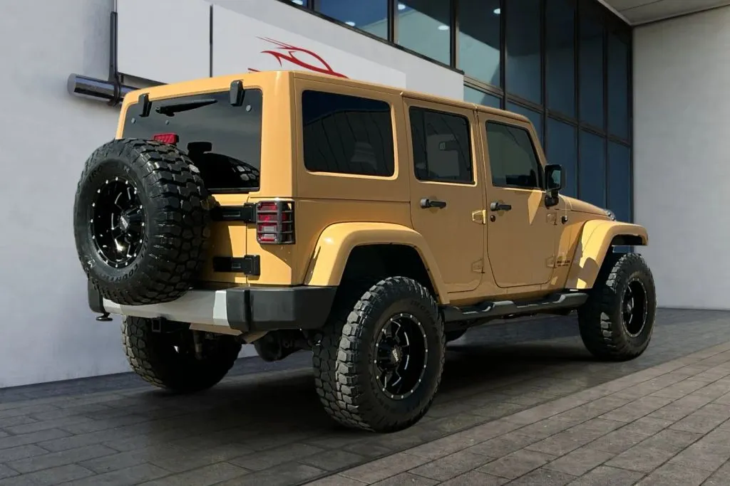 More photos of 2013 Jeep Wrangler Unlimited Sahara Sport Utility 4D at Drive N-Motion Greeley, CO