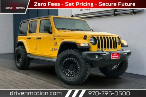 Yellow 2020 Jeep Wrangler Unlimited Sahara Sport Utility 4D for sale in Greeley, CO