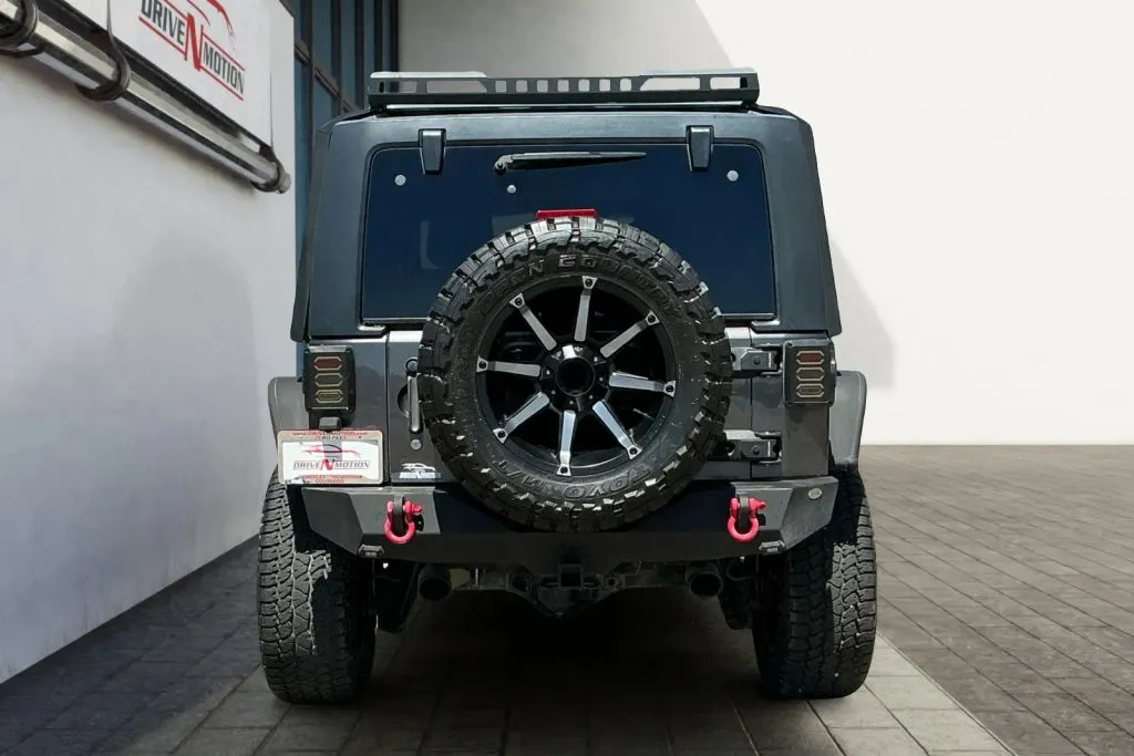 More photos of 2014 Jeep Wrangler Unlimited Sport SUV 4D at Drive N-Motion Greeley, CO