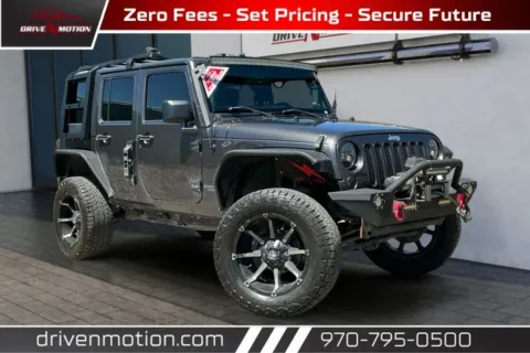 Gray 2014 Jeep Wrangler Unlimited Sport SUV 4D for sale in Greeley, CO
