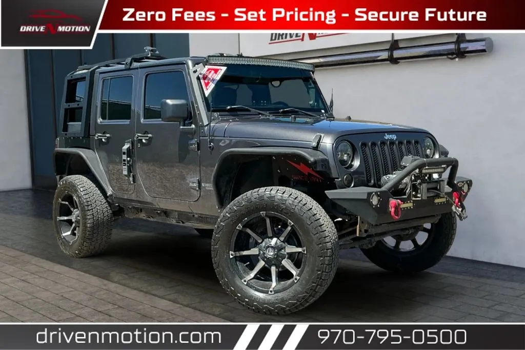 Gray 2014 Jeep Wrangler Unlimited Sport SUV 4D for sale in Greeley, CO