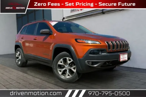Orange 2014 Jeep Cherokee TrailHawk Sport Utility 4D for sale in Greeley, CO