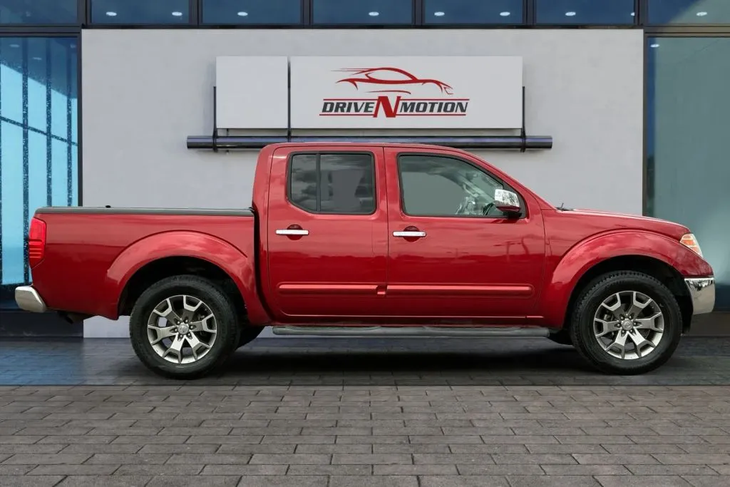 Another view of 2015 Nissan Frontier Crew Cab SL Pickup 4D 5 ft for sale in Greeley, CO at Drive N-Motion Greeley
