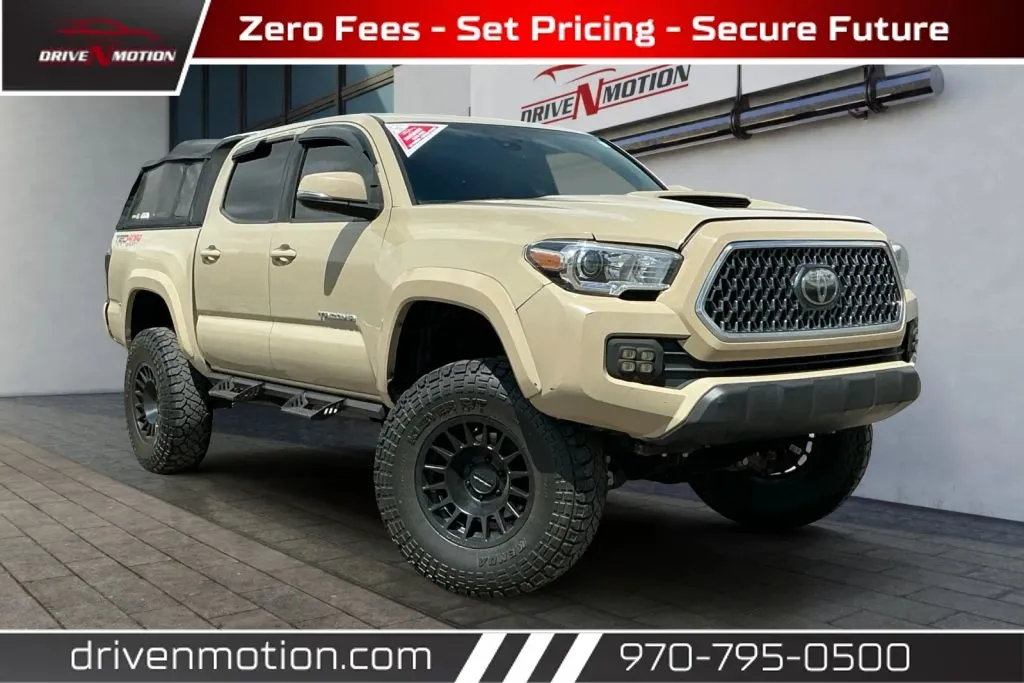 Beige 2019 Toyota Tacoma Double Cab TRD Sport Pickup 4D 5 ft for sale in Greeley, CO
