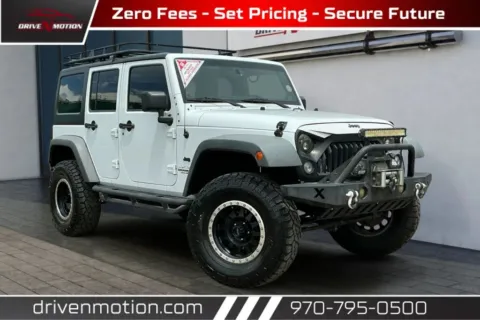White 2014 Jeep Wrangler Unlimited Sport SUV 4D for sale in Greeley, CO
