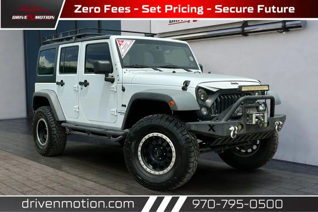 White 2014 Jeep Wrangler Unlimited Sport SUV 4D for sale in Greeley, CO