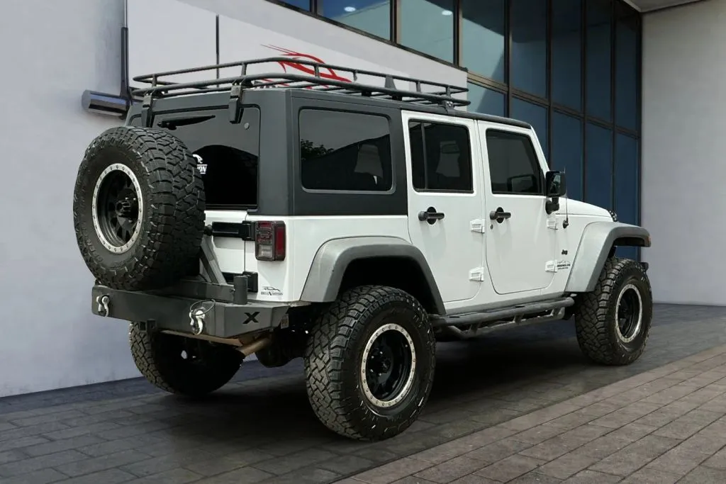 More photos of 2014 Jeep Wrangler Unlimited Sport SUV 4D at Drive N-Motion Greeley, CO