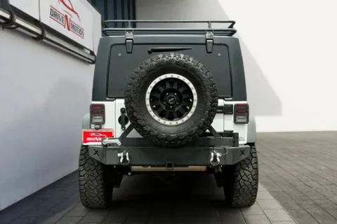 More photos of 2014 Jeep Wrangler Unlimited Sport SUV 4D at Drive N-Motion Greeley, CO