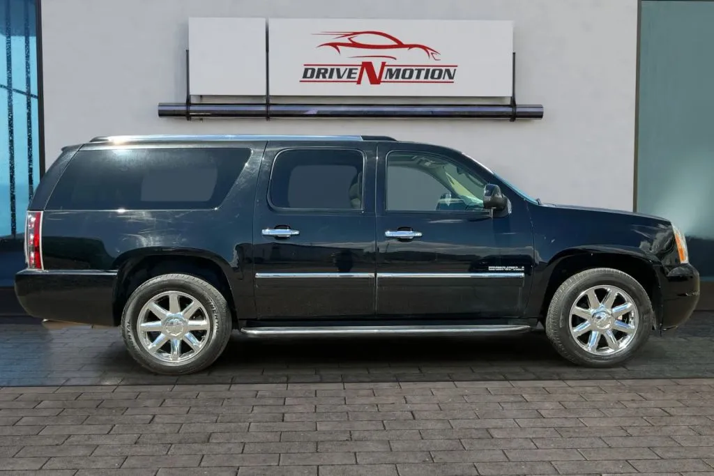Another view of 2013 GMC Yukon XL 1500 Denali Sport Utility 4D for sale in Greeley, CO at Drive N-Motion Greeley