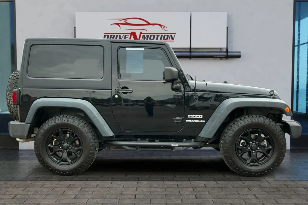 Another view of 2013 Jeep Wrangler Sport SUV 2D for sale in Greeley, CO at Drive N-Motion Greeley