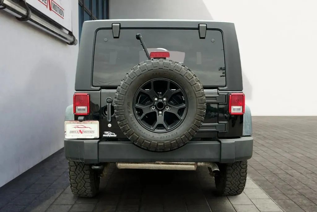 More photos of 2013 Jeep Wrangler Sport SUV 2D at Drive N-Motion Greeley, CO