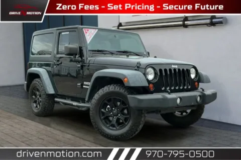 Black 2013 Jeep Wrangler Sport SUV 2D for sale in Greeley, CO