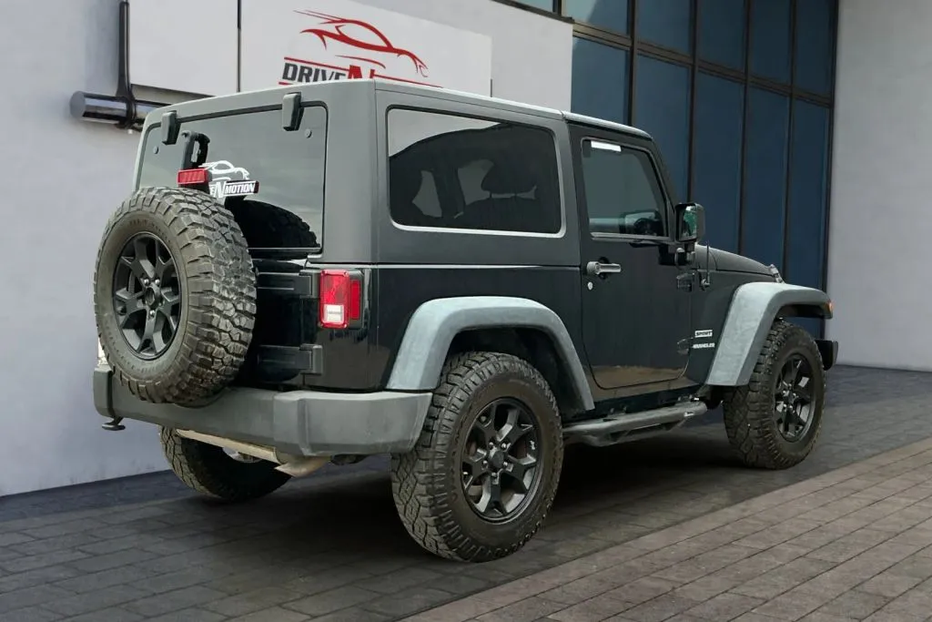 More photos of 2013 Jeep Wrangler Sport SUV 2D at Drive N-Motion Greeley, CO