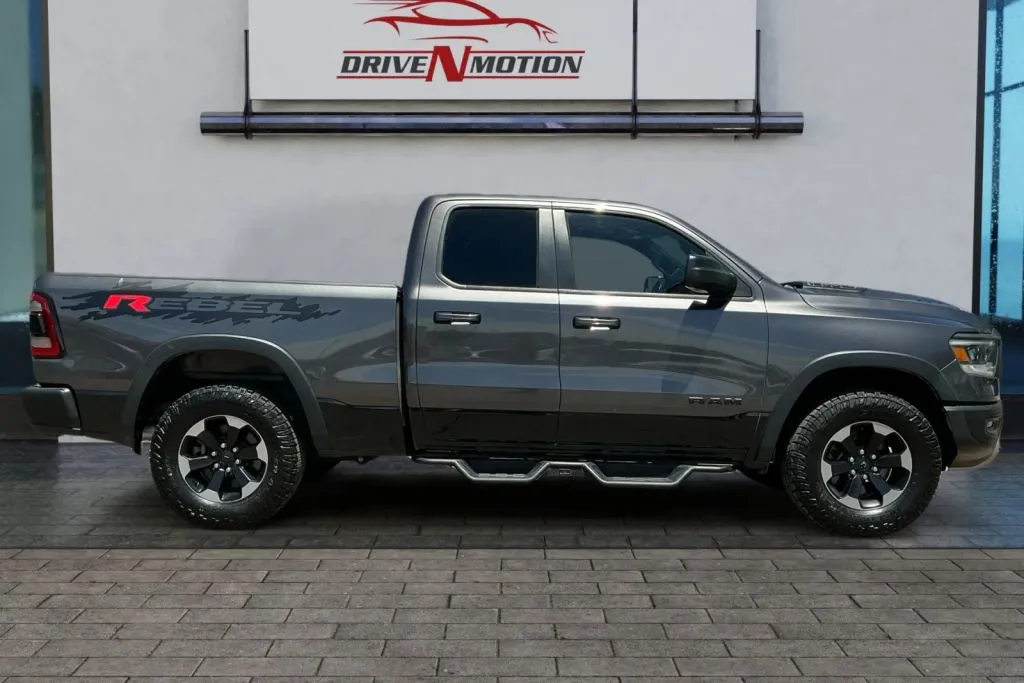 Another view of 2019 Ram 1500 Quad Cab Rebel Pickup 4D 6 1/3 ft for sale in Greeley, CO at Drive N-Motion Greeley