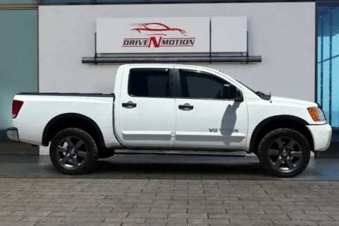 Another view of 2015 Nissan Titan Crew Cab SV Pickup 4D 5 1/2 ft for sale in Greeley, CO at Drive N-Motion Greeley