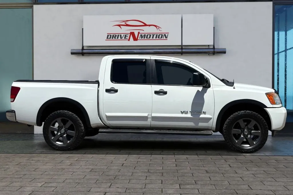 Another view of 2015 Nissan Titan Crew Cab SV Pickup 4D 5 1/2 ft for sale in Greeley, CO at Drive N-Motion Greeley