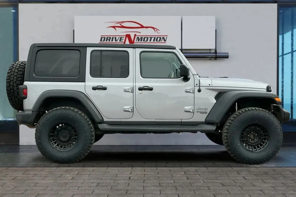 Another view of 2020 Jeep Wrangler Unlimited Sport S Sport Utility 4D for sale in Greeley, CO at Drive N-Motion Greeley